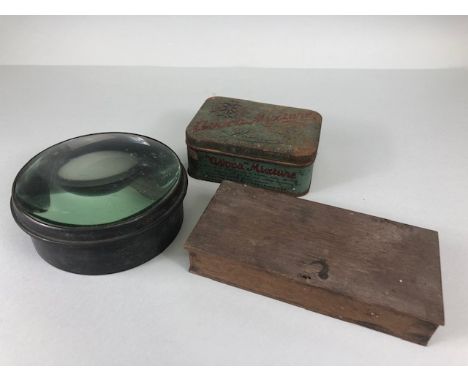 Antique Scientific interest,  a large Magnifying lens , a boxed set of traveling gold scales  and a tin containing small barr