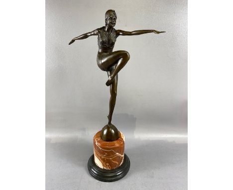Art Deco metal sculpture of a dancing woman on a marble base approximately 54cm high