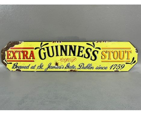 Advertising sign. Metal and enamel sign for Guinness stout approximately 47 x 13 cm