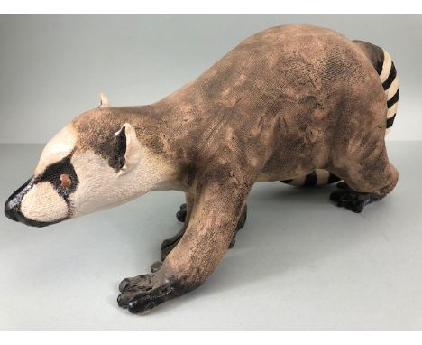 Pottery sculpture , a naturalistic art sculpture of a ring tailed lemur approximately 39 x 19 cm (crack to rear foot)
