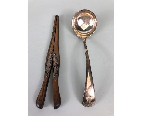 Hallmarked silver ladle approx 18cm in length and 78g along with a pair of Ebony glove stretchers with silver hallmarked moun