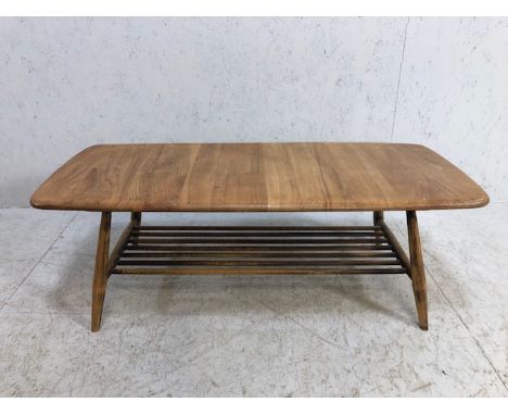 Blond Ercol coffee table, approx 105cm x 46cm x 36cm 