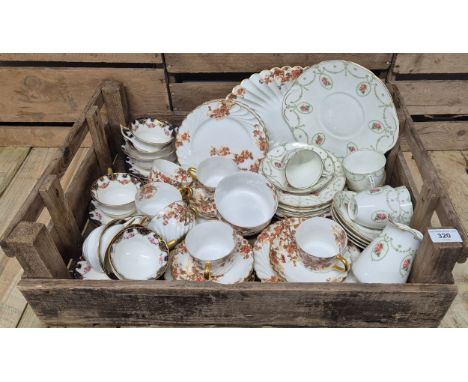 A crate of vintage tea ware; Aynsley flower pattern tea service, Limoge flower pattern tea service &amp; Royal Doulton tea se