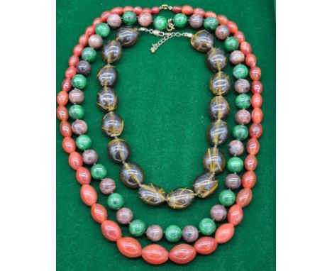 Three vintage strands of bead necklaces. Orange/ red possibly agate. 