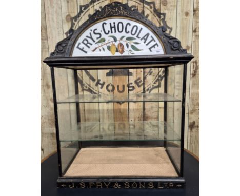 Antique Fry's Chocolate Counter top display cabinet. Milk glass painted insert. Mirror back sliding doors. Side glass panels,