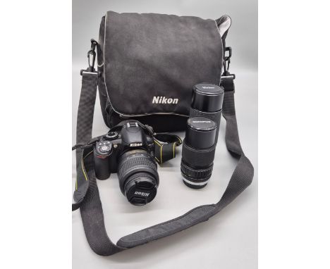 Nikon model 3100 digital camera with spare lenses &amp; bag; Vivatar &amp; Olympus lenses 