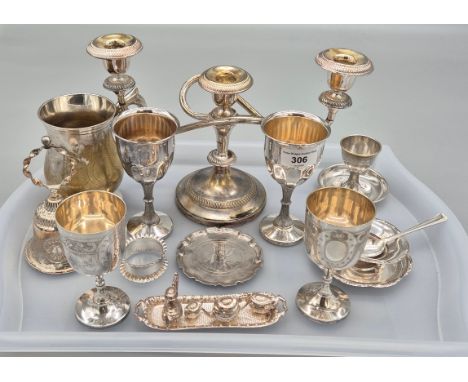 A Tray of Silver plated ware; Silver plated Goblets, three branch candle stick, silver plated egg holder, Sheffield silver na