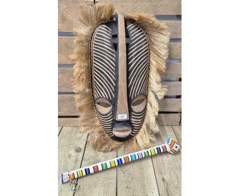 African Bead worked Knobkerrie war club and large carved wooden wall mask. [Club- 52cm length] 