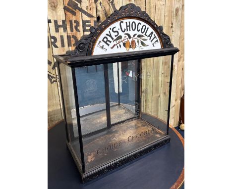Antique Fry's Chocolate Counter top display cabinet. Milk glass painted insert. Mirror back sliding doors. Front and side gla