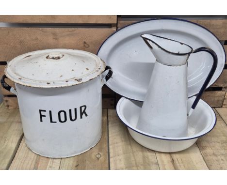 A collection of early 20th century kitchen enamel ware; bread bin, water jug &amp; bowl &amp; serving platter