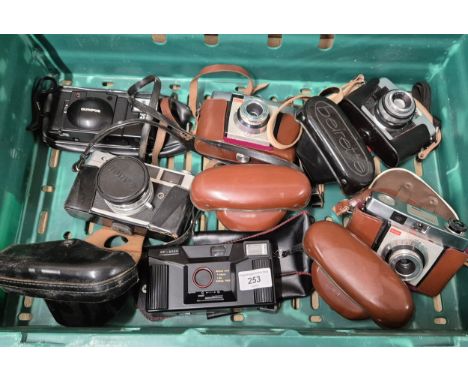 A collection of six vintage Cameras; Cannon QL camera, Olympus A11 camera, two kodak colour snap 35 cameras &amp; others