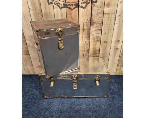 Two vintage metal travel trunks