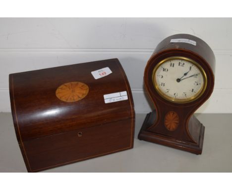 WOODEN WRITING RACK WITH SHELL INLAY TOGETHER WITH A SMALL MANTEL CLOCK WITH SIMILAR DECORATION