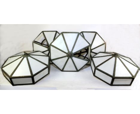 Five vintage brass and opaque glass ceiling lights each with four light fittings, two have all their glass panels and three a