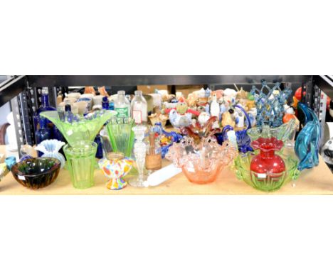 Glasswares to include seven blue glass poison bottles, rolling pin and pressed and moulded dishes, vases and bowls,