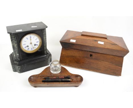 19th century rosewood tea caddy lacking fittings and a black slate twin train mantel clock,