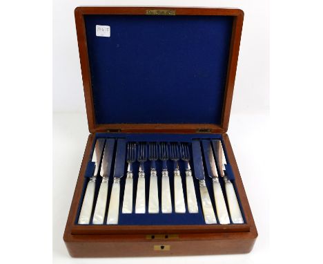 A boxed set of 18 pairs of mother of pearl tea knives and forks by John Gilbert of Birmingham, arranged on 3 trays 