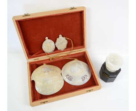 Cased onyx miniature font, 6 cm high 7cm wide and carved Mother of pearl plaques depicting The Last Supper and other religiou