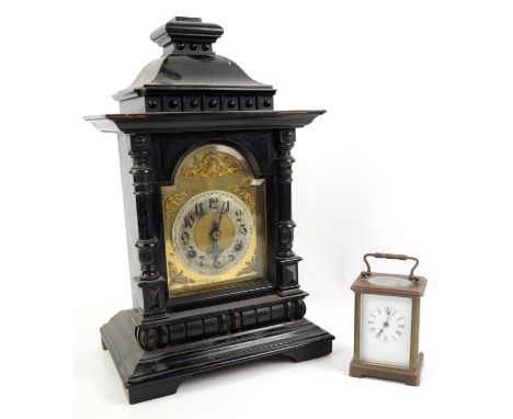 Brass and four glass carriage clock with lever movement, Roman numerals and an ebonised wood mantel clock, 42cm high, (2),
