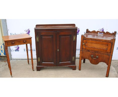 Early 19th century mahogany side table, with ebony lined frieze drawer, on turned legs and castors, H73 W50.5 cm, an oak cupb