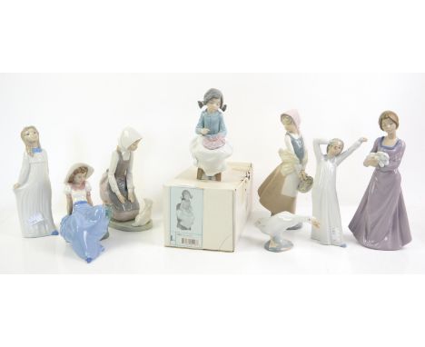 Collection of Lladro and NAO figurines
