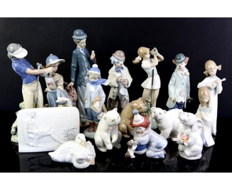 Collection of Lladro and NAO figures to include Charlie Chaplin, No. 5233, "Resting Polar Bear" No, 1208,  "Attentive Polar B