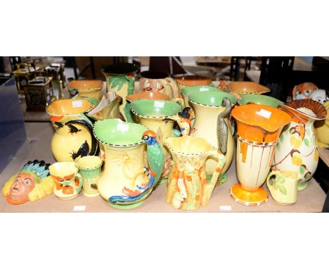 Burleigh Ware and Myott & Son jugs with moulded and painted bird, squirrel and floral decoration and a wall plaque moulded as