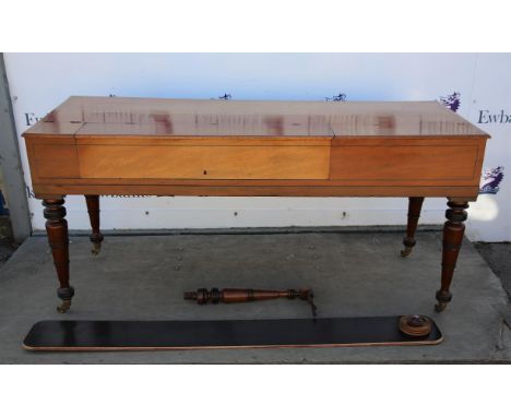 Early 19th century mahogany cased square piano, with ebony inlay on ring turned tapering legs and brass castors, labelled Tho