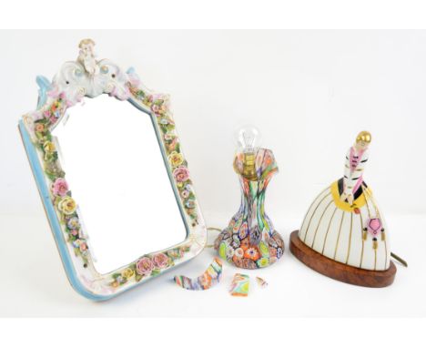 Sitzendorf style dressing table mirror moulded with a cherub and roses, 32cm x 20cm, millefiori lamp base and a porcelain lam