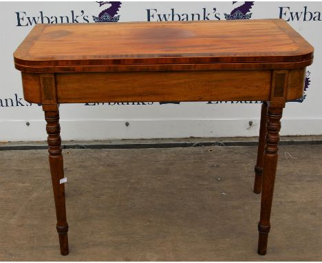 Early 19th century mahogany and rosewood crossbanded foldover card table, with red baize interior over boxwood inlaid frieze 