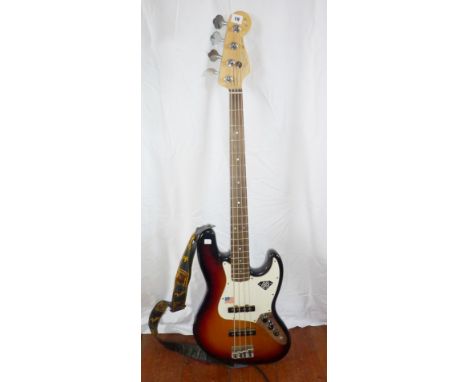 Guitar: Fender Jazz Bass , 2006 60th Anniversary Edition, three-colour Sunburst, with diamond set into headstock, S.N. Z61199