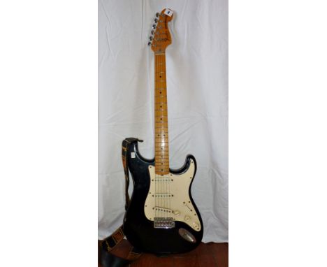 Guitar: Fender Stratocaster Solid guitar, Black, S.N. E215905, U.S.A., with Fender flight case