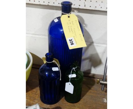     Three Vintage Apothecary Bottles To Include A Large Blue Glass Poison Bottle      