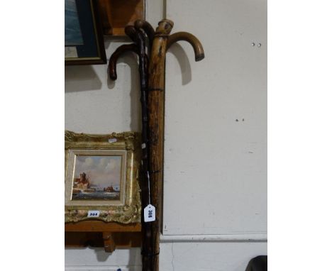     A Bundle Of Vintage Walking Sticks                                              