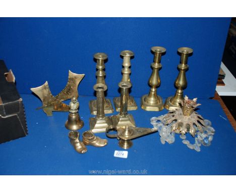 A quantity of Brass including three Pairs of Candlesticks, small Aladdin Lamp, old Brass Boots, Bell, etc.