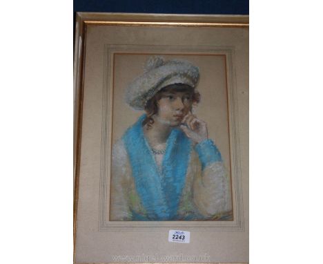 A framed and mounted Charcoal Portrait of a Young Lady signed lower right J. Wilkie, 8 3/4'' x 13"