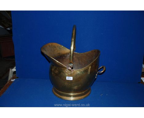 A Brass helmet Coal Scuttle