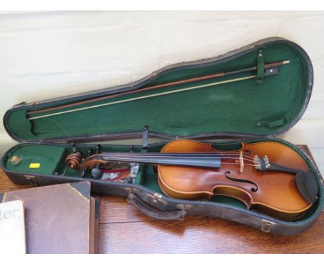 A cased violin and bow, no label