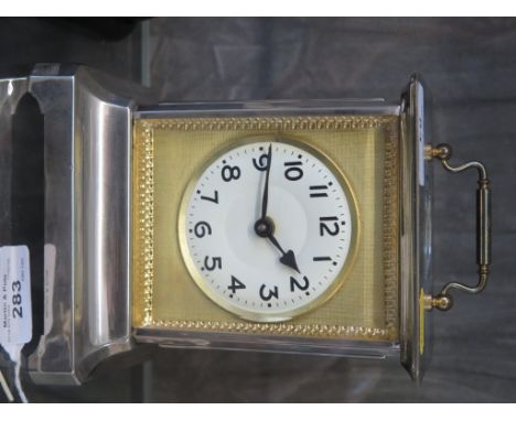 A Gorgerat & Co. Japanese chromed and brass musical carriage clock, with Arabic numerals, and Japanese labels, 18cm high