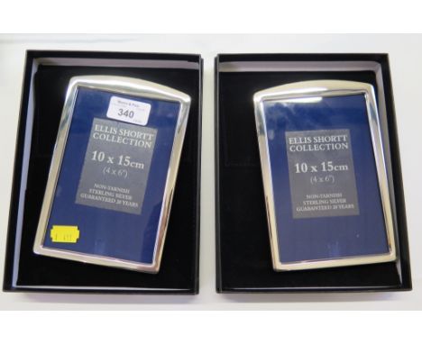 a pair of 925 silver quality Ellis Short collection 10cm x 15cm portrait photo frames with polished lacquered backs and 20 ye