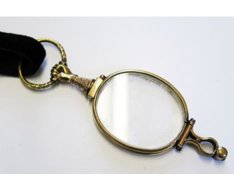 A gold plated lorgnette