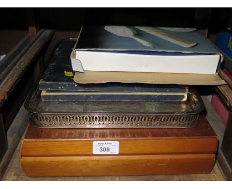 A silver plated rectangular tray, with pierced gallery and inscribed scroll engraved decoration, a dressing table set and var