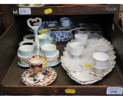 Various egg cups and stands including two Royal Worcester with chicken form covers (boxed), a present from Dovercroft twin st