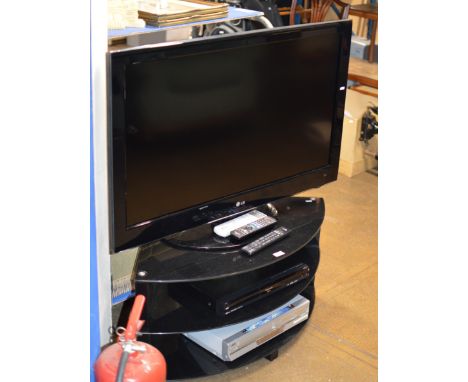 LG 42" LCD TV WITH REMOTE, STAND, DVD PLAYER ETC     