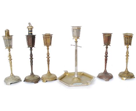 An unusual brasswares set, each piece in the form of a street light to include ashtray, cigarette holder, lighter etc. 