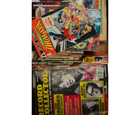 A large collection of vintage comics and record collector magazines dating from the 20th century