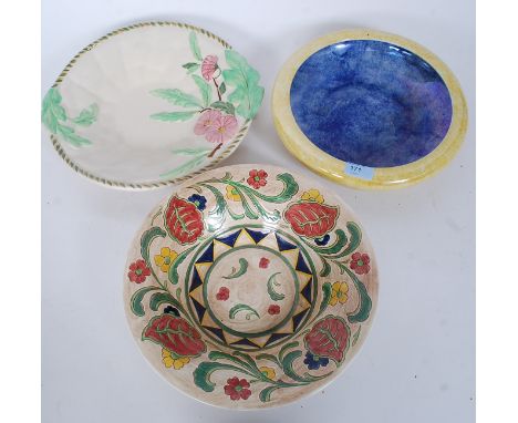 A collection of three pieces of ceramic ware to include a Falcon Ware dish, Byzanta Ware by Grimwades dish and another. H28cm