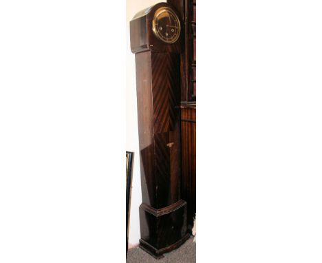 A 1930's Smiths Art Deco style granddaughter clock having raised dial over mahogany trunk. 155cm tall.