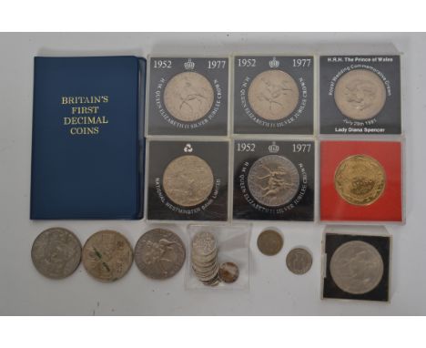A collection of vintage British Crowns - commemorative coins some in cases etc