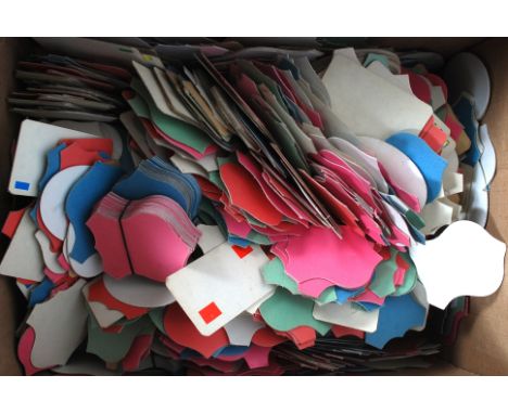 A box of vintage cardboard cut out shield / panels in various shapes and colours